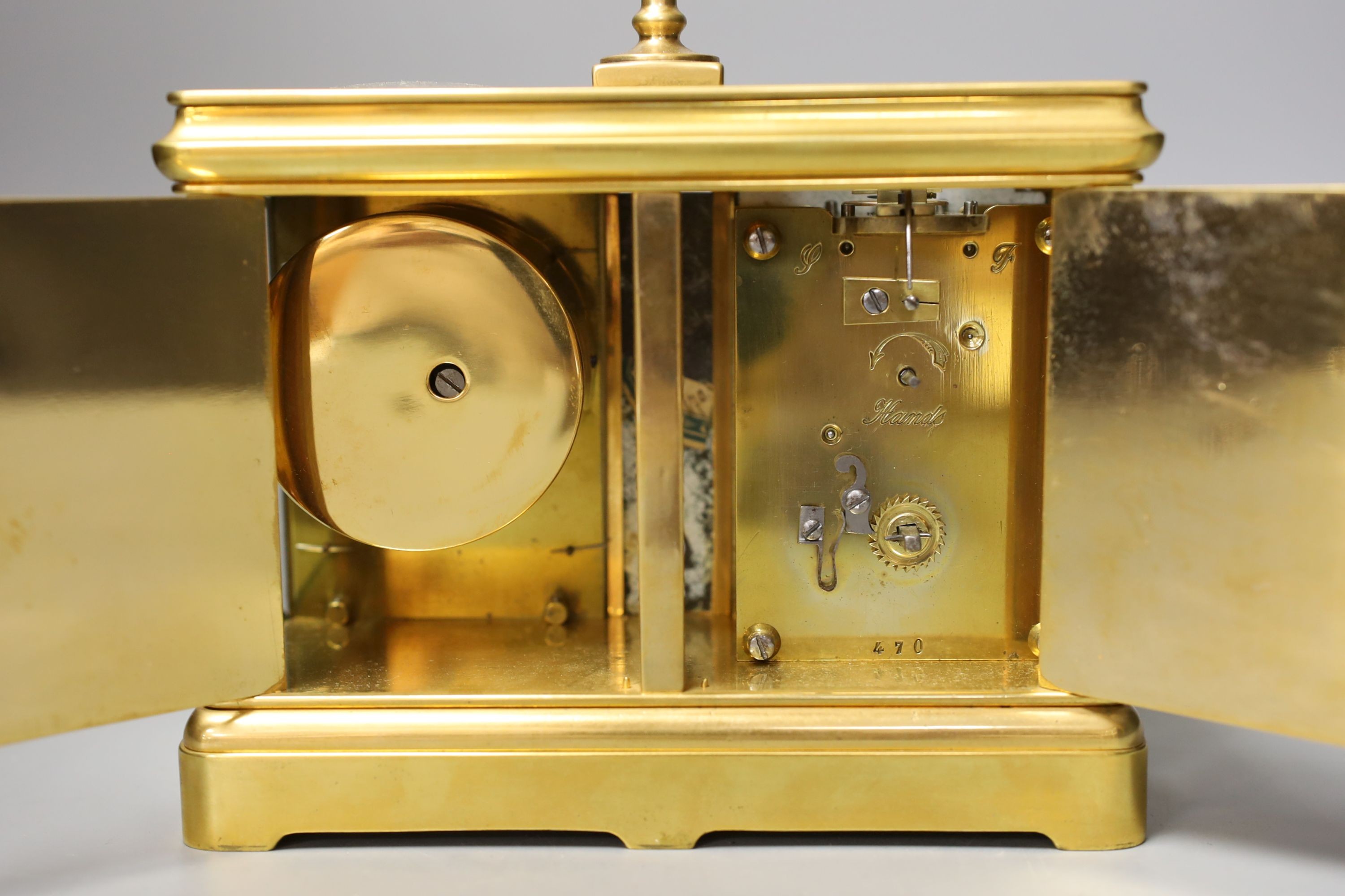 A French combination brass carriage timepiece, barometer, thermometer and compass, retailed by Reed & Son